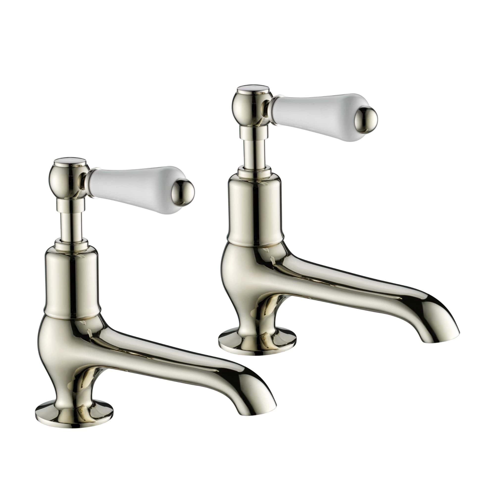 Brass bathroom taps set with vintage design, polished finish, suitable for classic and traditional bathroom decor. Elegant hand-lever style faucets for sink or basin use.