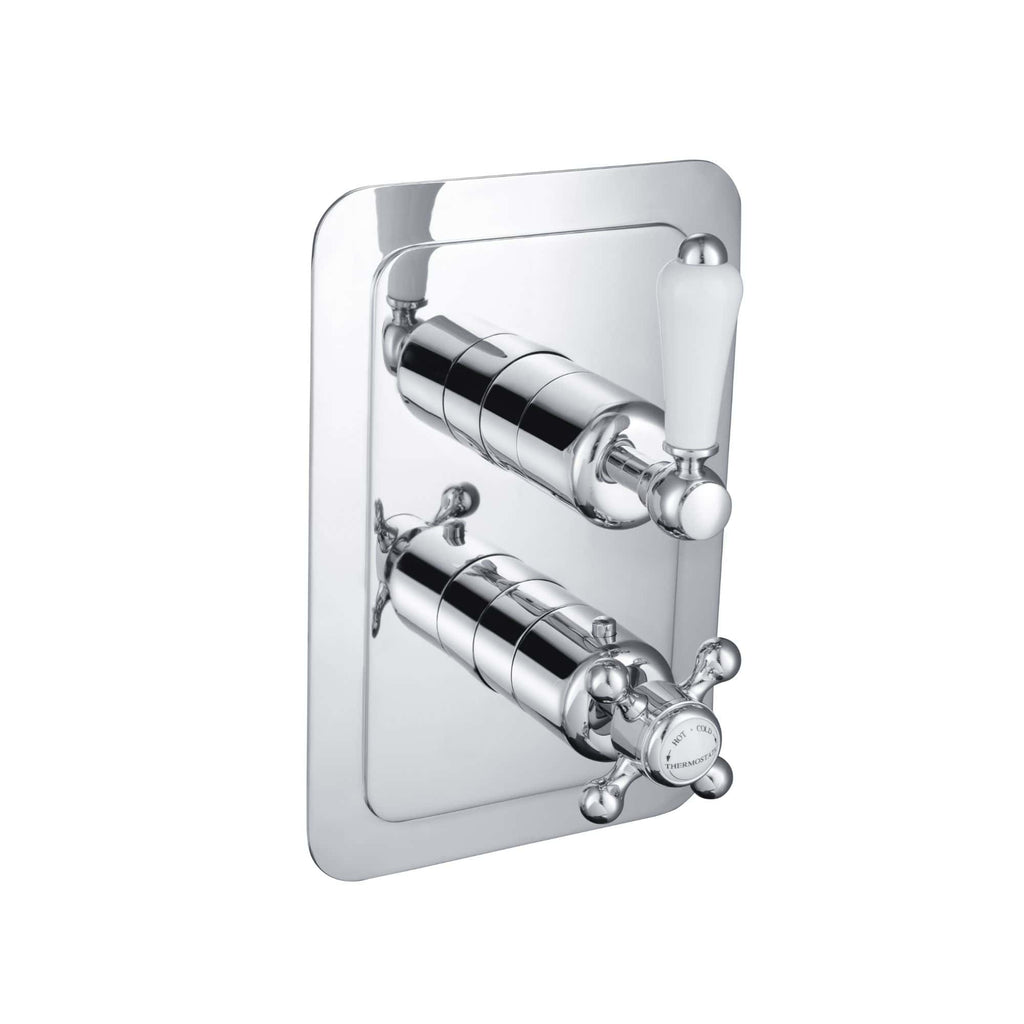 Polished chrome bath shower mixer tap with dual controls and vintage design, wall-mounted style for luxury bathroom renovations.