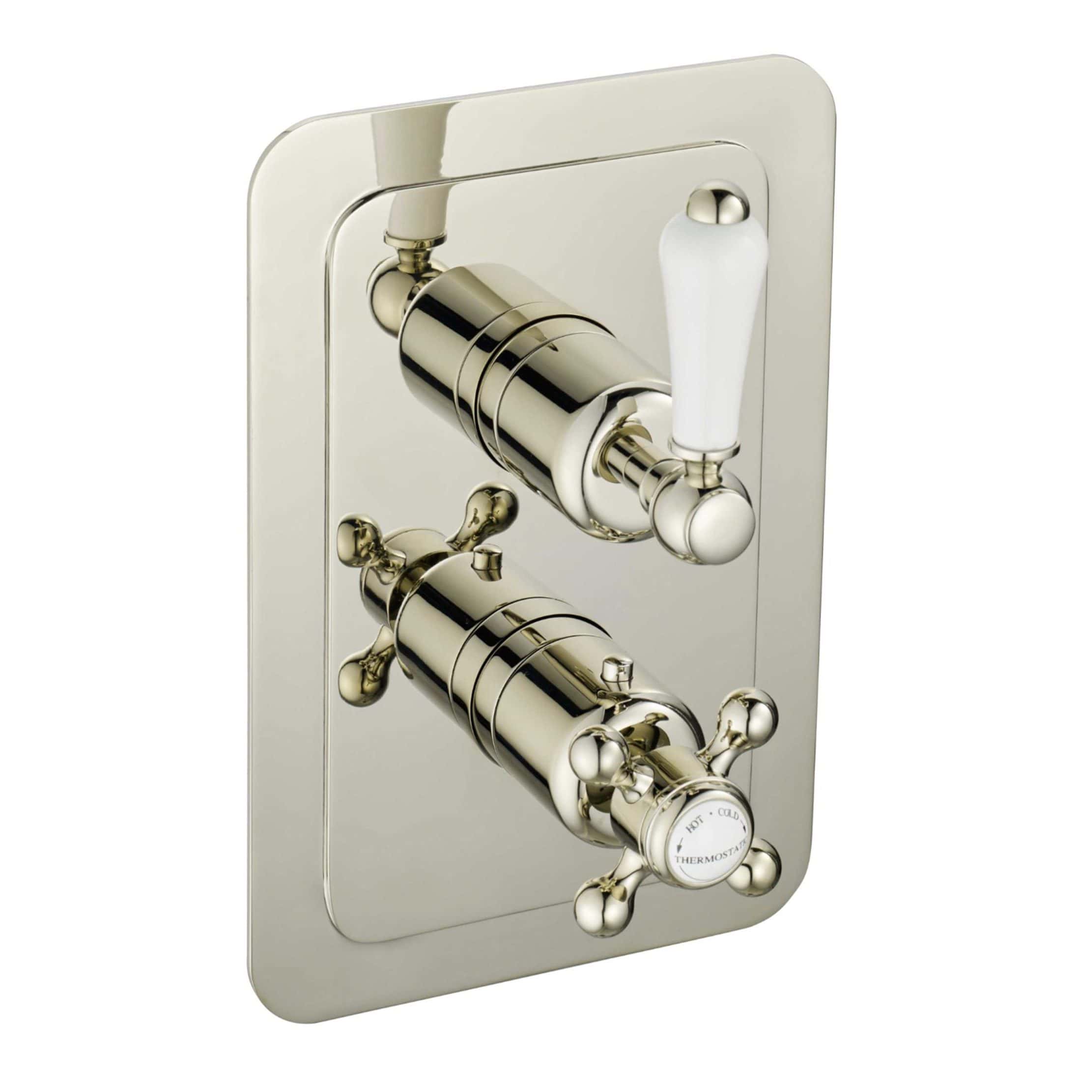 Polished chrome bathroom thermostatic mixing valve with dual control levers for precise temperature regulation and enhanced water safety. Ideal for modern bathroom installations.