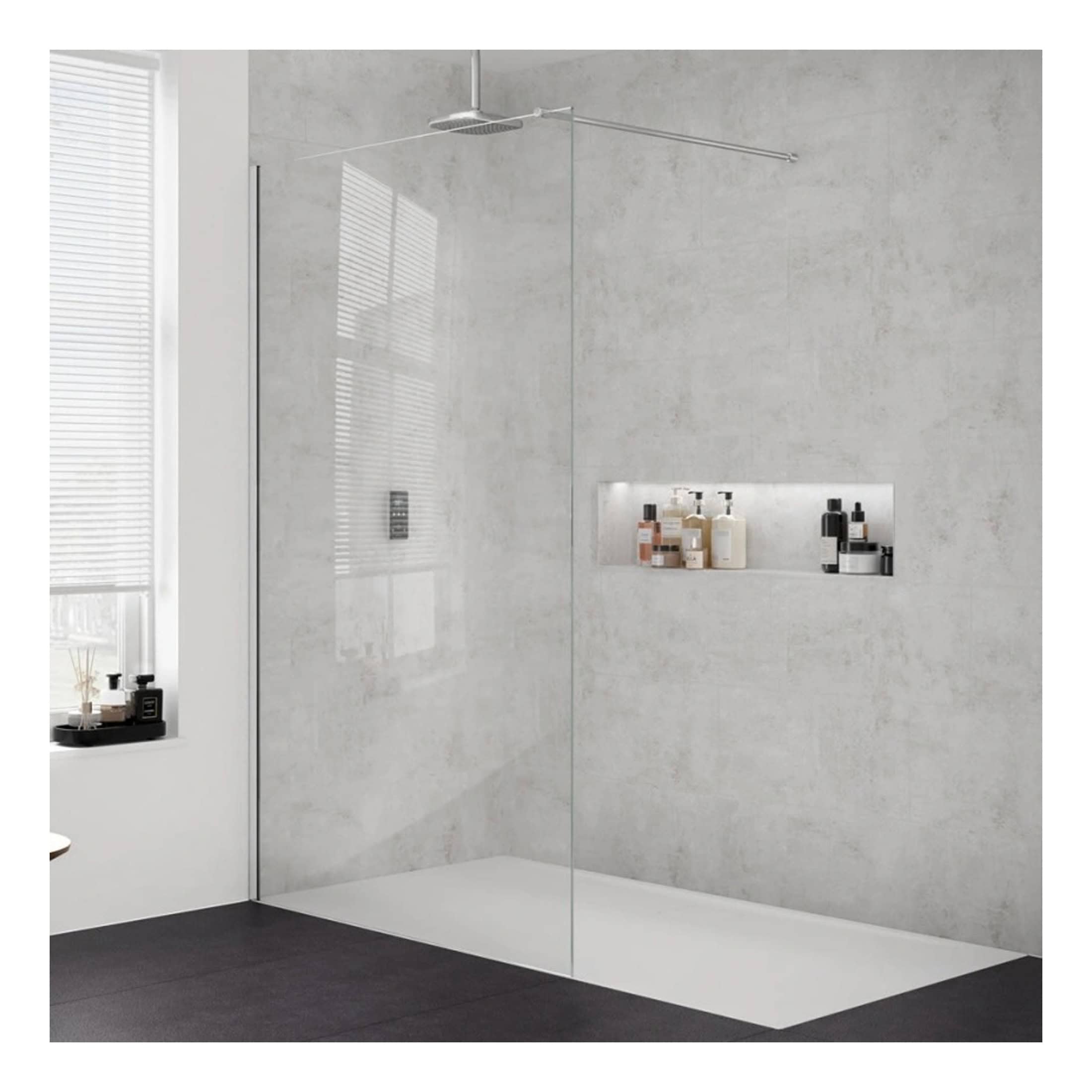 Clear glass walk-in shower with modern rainfall showerhead and sleek niche for toiletries in contemporary bathroom design.