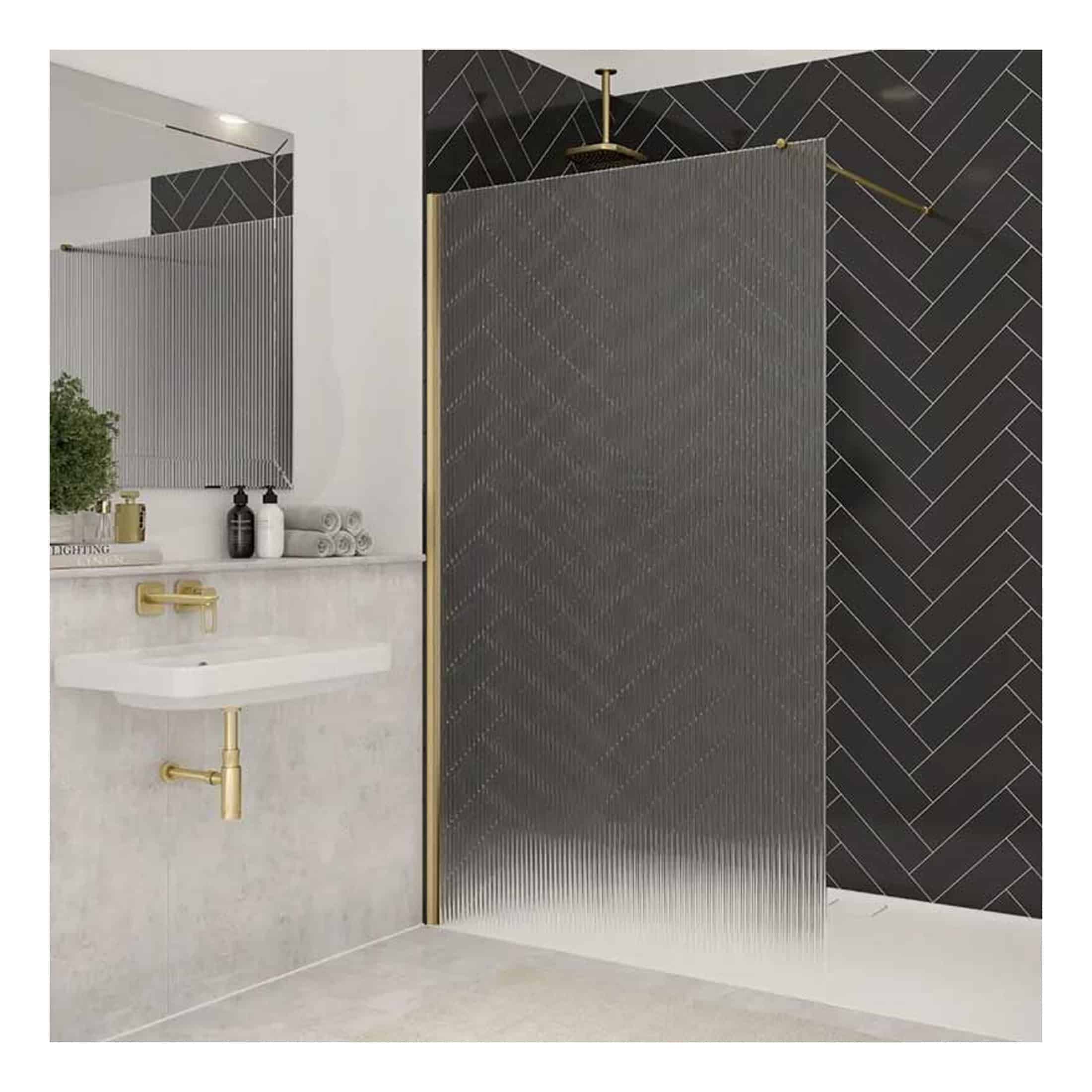 Luxury modern bathroom with black herringbone tiles, gold fixtures, and a textured privacy shower screen, creating a sleek and sophisticated space for bathroom renovation and stylish design.
