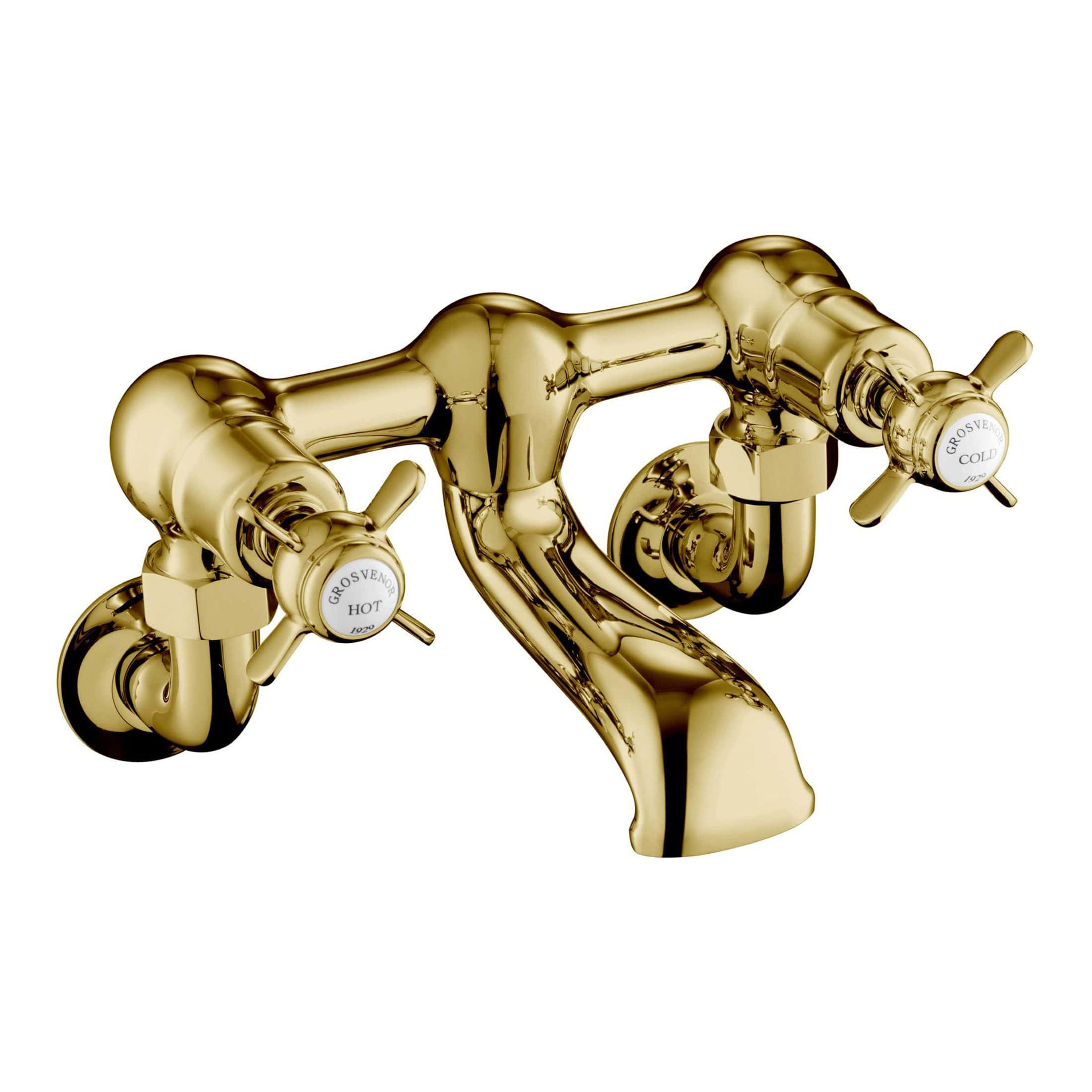 Shiny gold vintage style bathroom tap with separate hot and cold handles, ideal for classic bathroom sinks, featuring traditional design and high-quality finish for elegant bathroom fixtures.