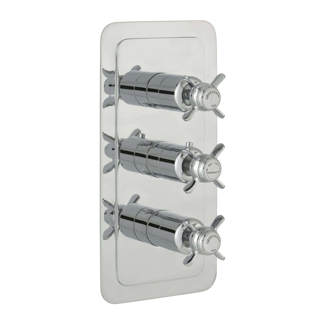 Shower valve with three chrome-finished handles on a polished metal backplate, designed for thermostatic control in luxury bathroom settings.