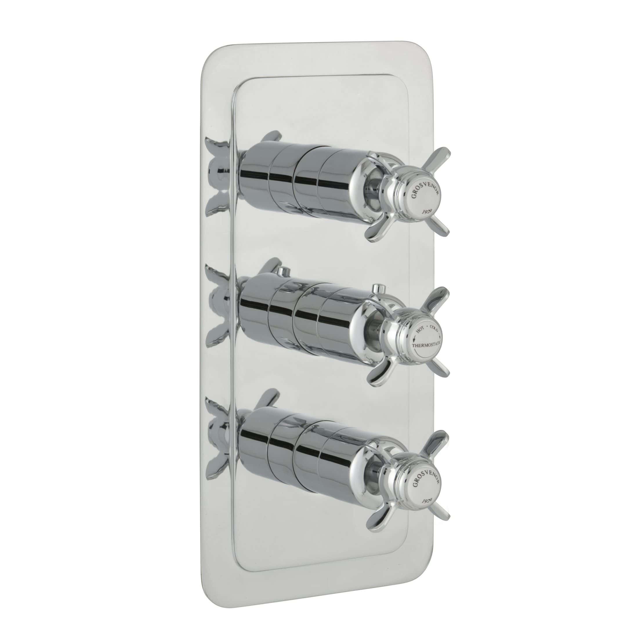 Shower valve with three chrome-finished handles on a polished metal backplate, designed for thermostatic control in luxury bathroom settings.