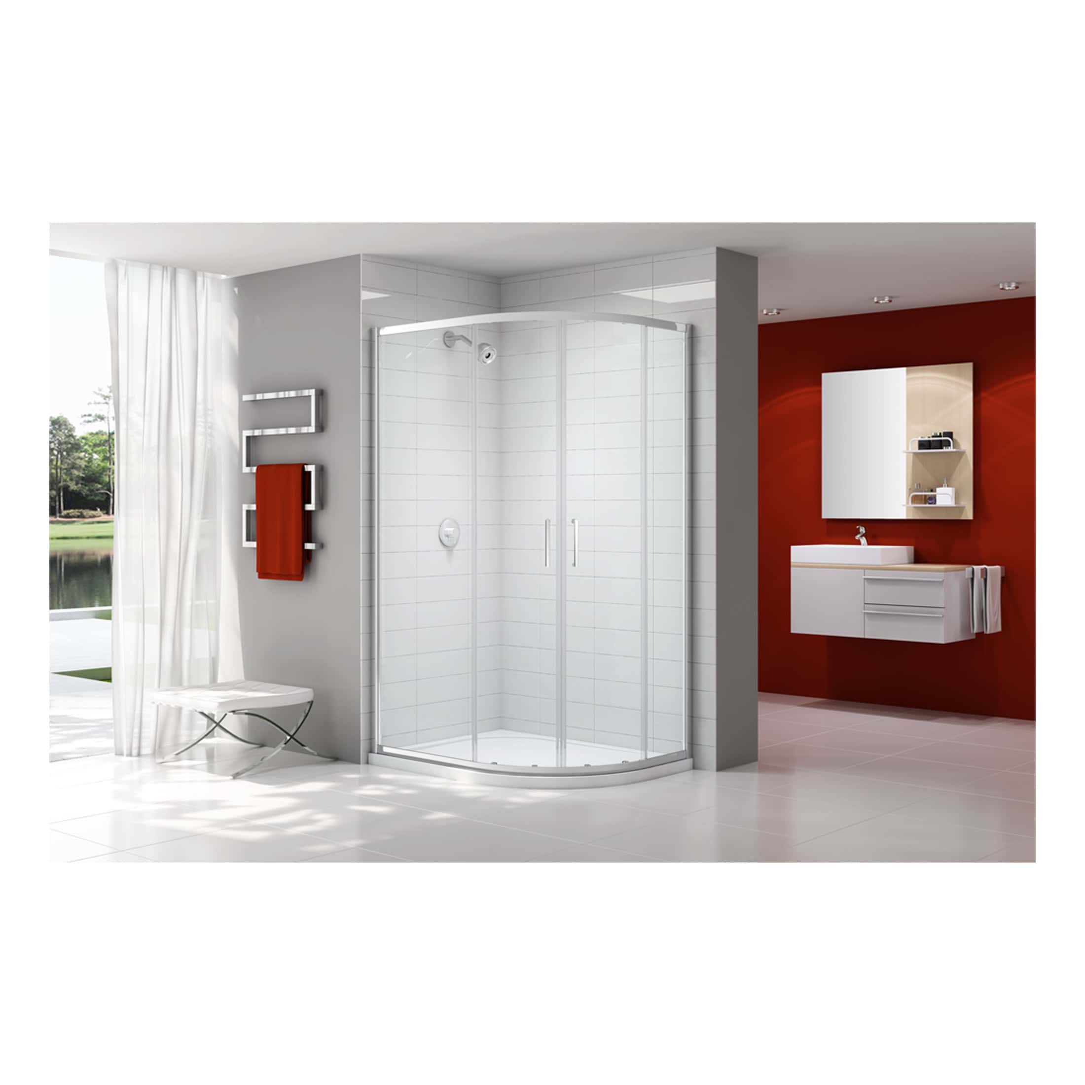 Sleek modern shower enclosures in a contemporary bathroom with red and white colour scheme, minimalist vanity unit, wall-mounted mirror, and heated towel rack for a stylish bathroom design.