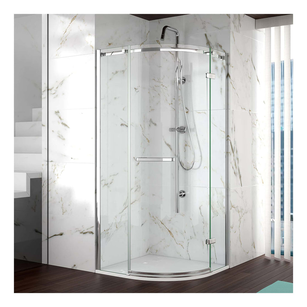 Sleek curved glass shower enclosure with chrome frame in a modern bathroom setting.