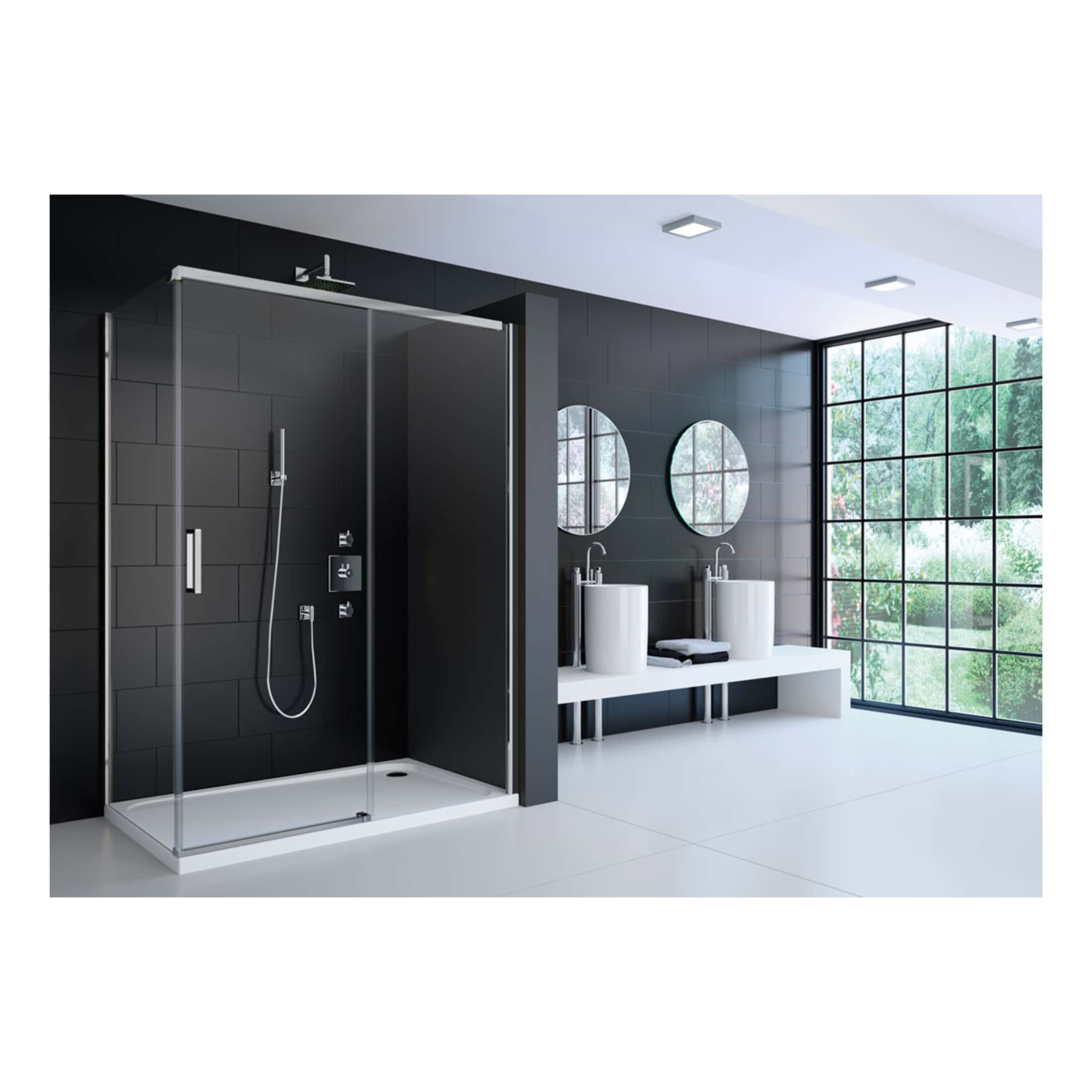 Sleek modern bathroom with a spacious black shower enclosure, double white washbasins with circular mirrors, minimalist design, and large windows offering natural light and a view of greenery.