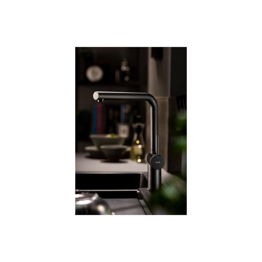 Futuristic black kitchen mixer tap with touch control in a modern kitchen setting. Elegant design enhances contemporary bathroom or kitchen aesthetics, combines functionality with sleek aesthetics.