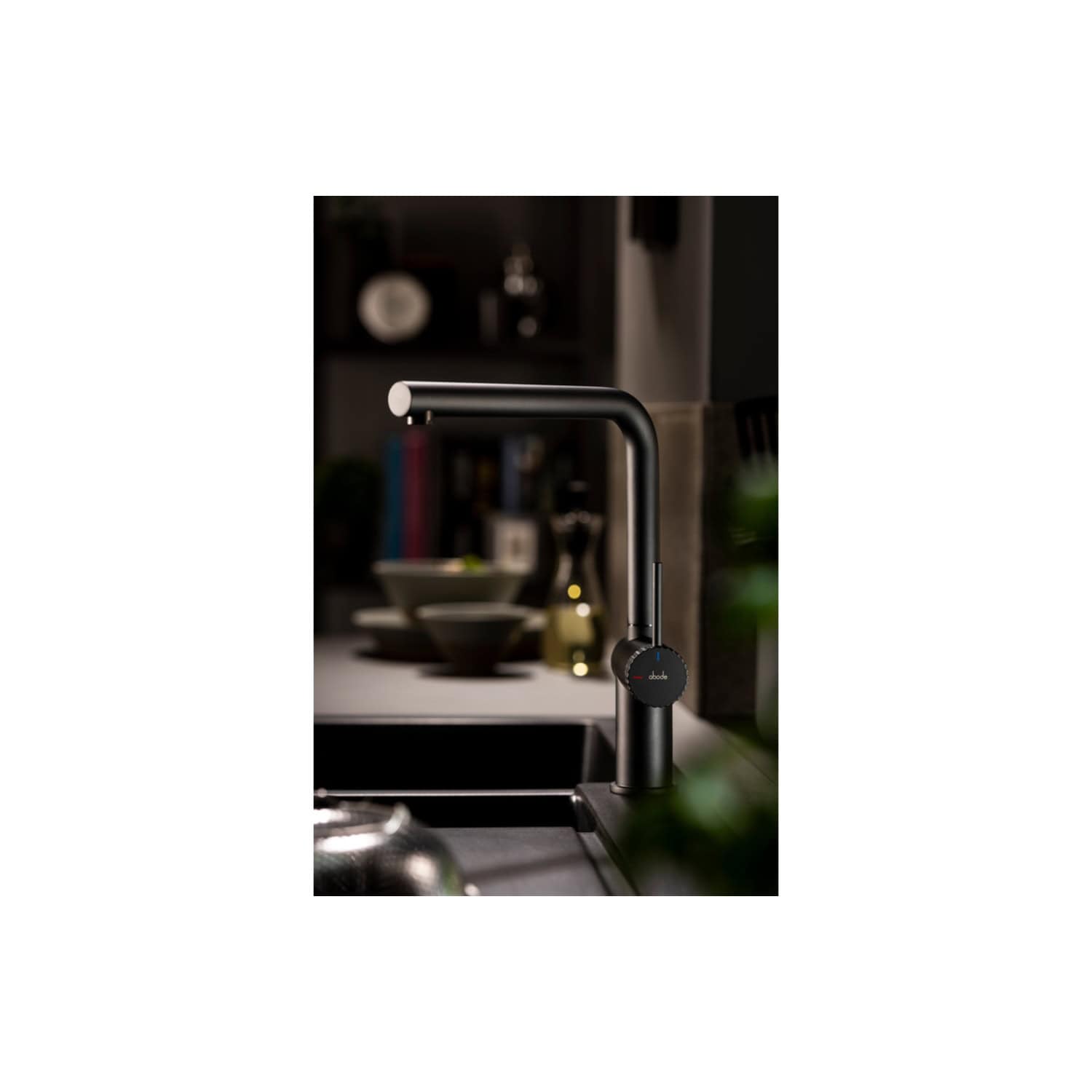 Futuristic black kitchen mixer tap with touch control in a modern kitchen setting. Elegant design enhances contemporary bathroom or kitchen aesthetics, combines functionality with sleek aesthetics.