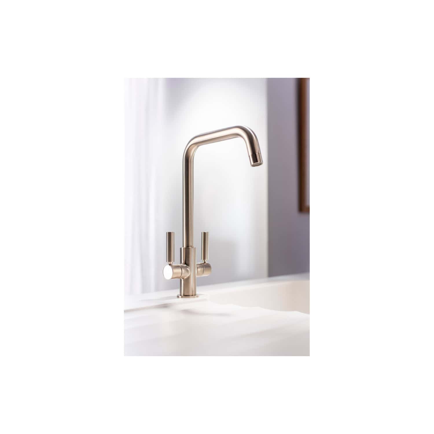 Polished stainless steel kitchen sink tap with high-arc spout and dual lever handles, ideal for modern bathroom or kitchen remodels, featuring sleek contemporary design from Bubly Bathrooms.