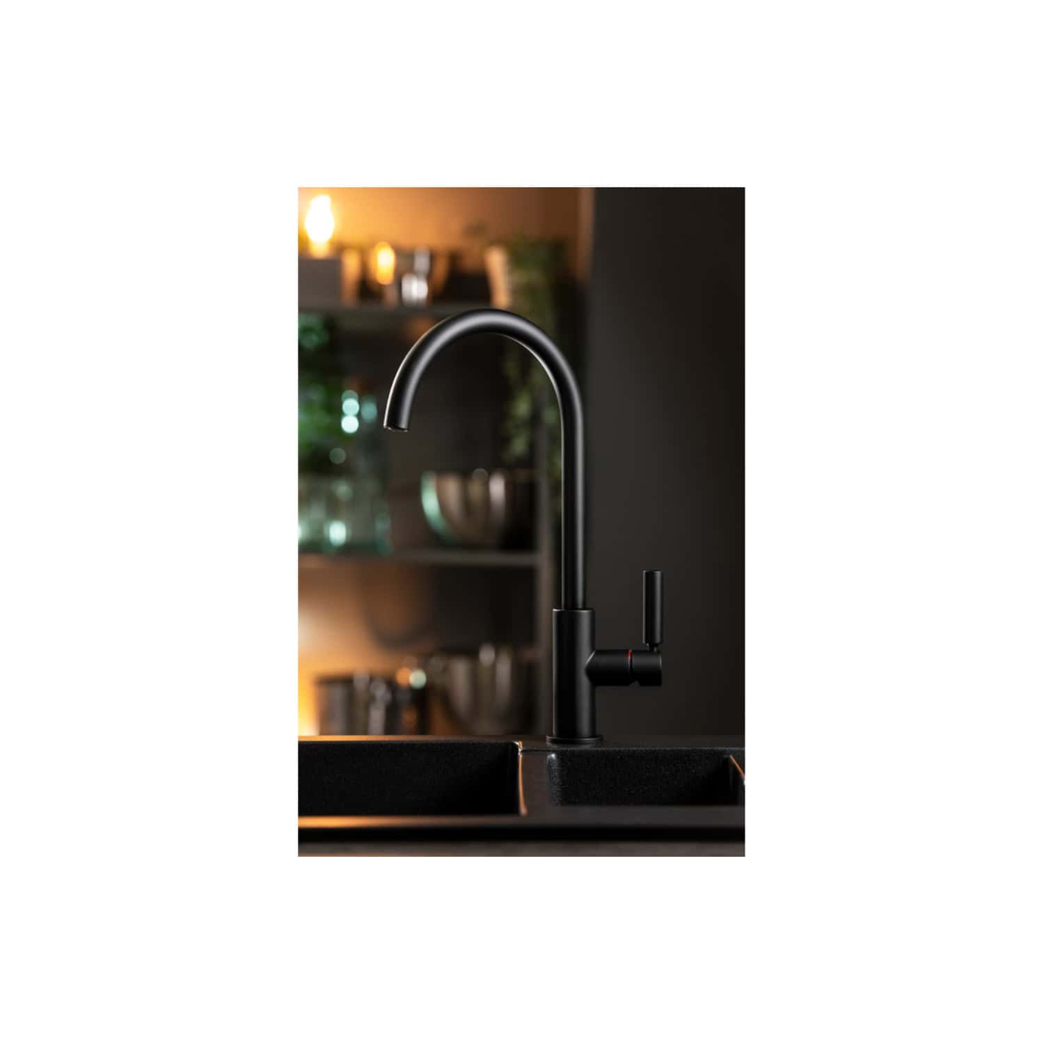 Brushed black modern kitchen sink tap, sleek design with high-arc spout and single lever, perfect for contemporary bathrooms and kitchens, Bubly Bathrooms London.