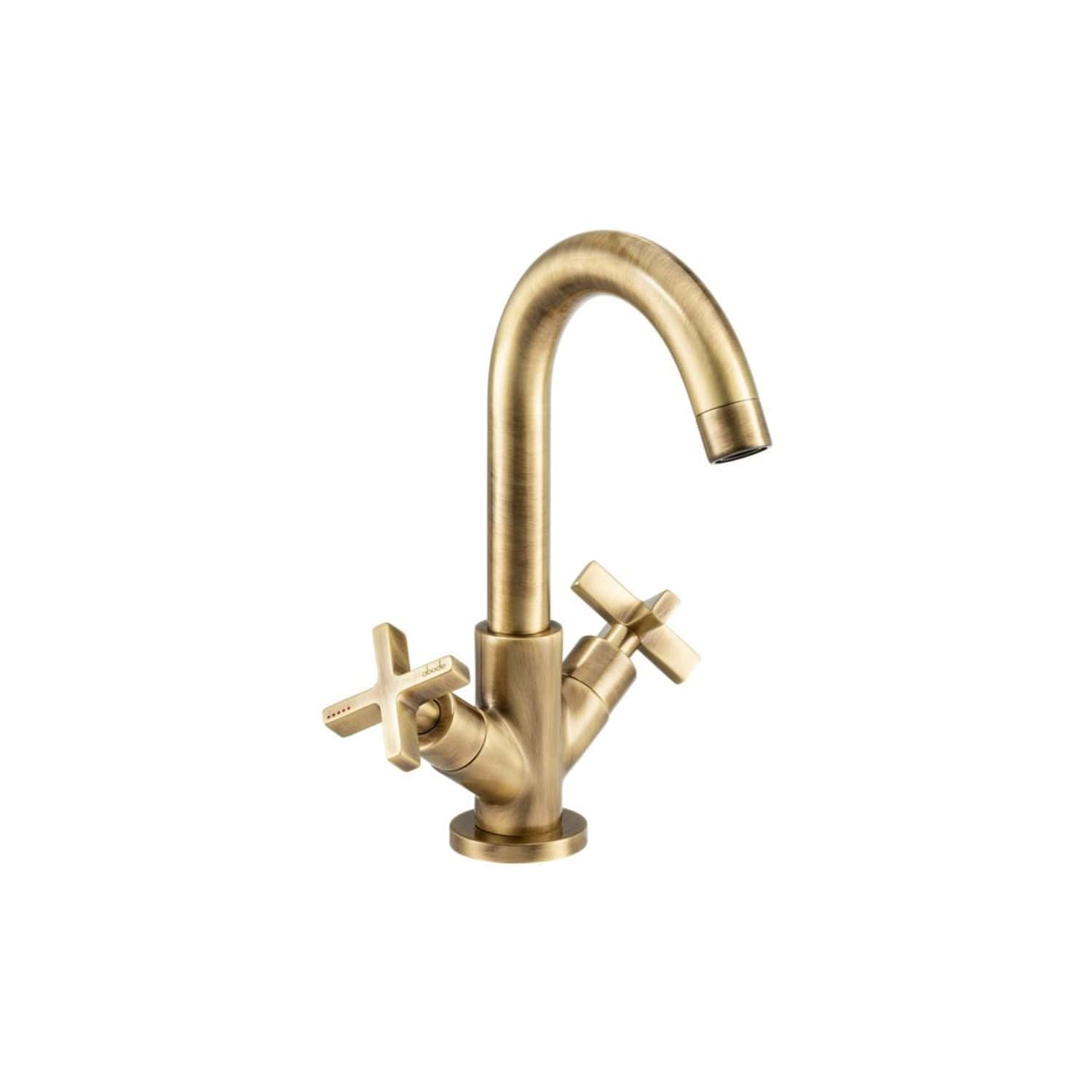 Sleek brass bathroom tap with dual cross handles and a curved spout, perfect for modern bathroom decor and high-quality plumbing fixtures.