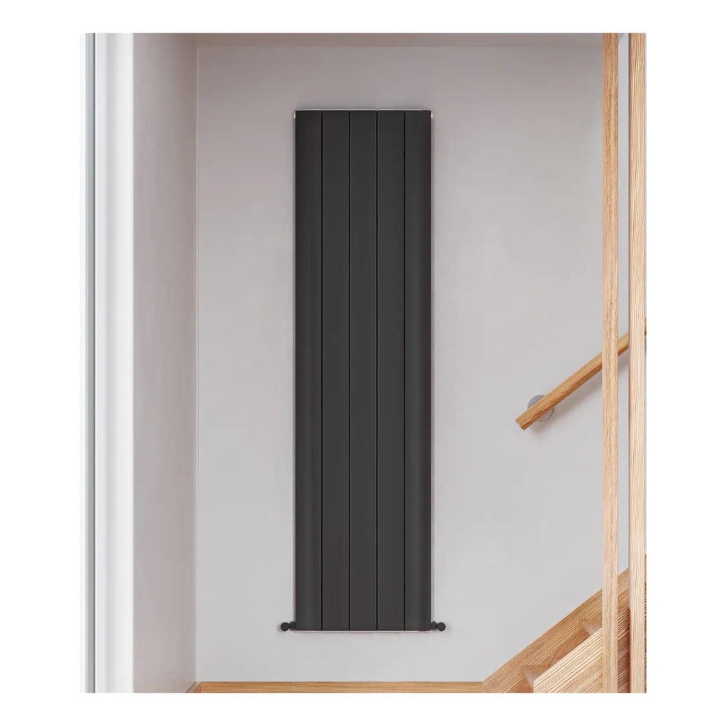 Sleek black vertical radiator in modern bathroom, perfect for heating and style. Minimalist design complements contemporary bathroom decor and maximises space efficiency.