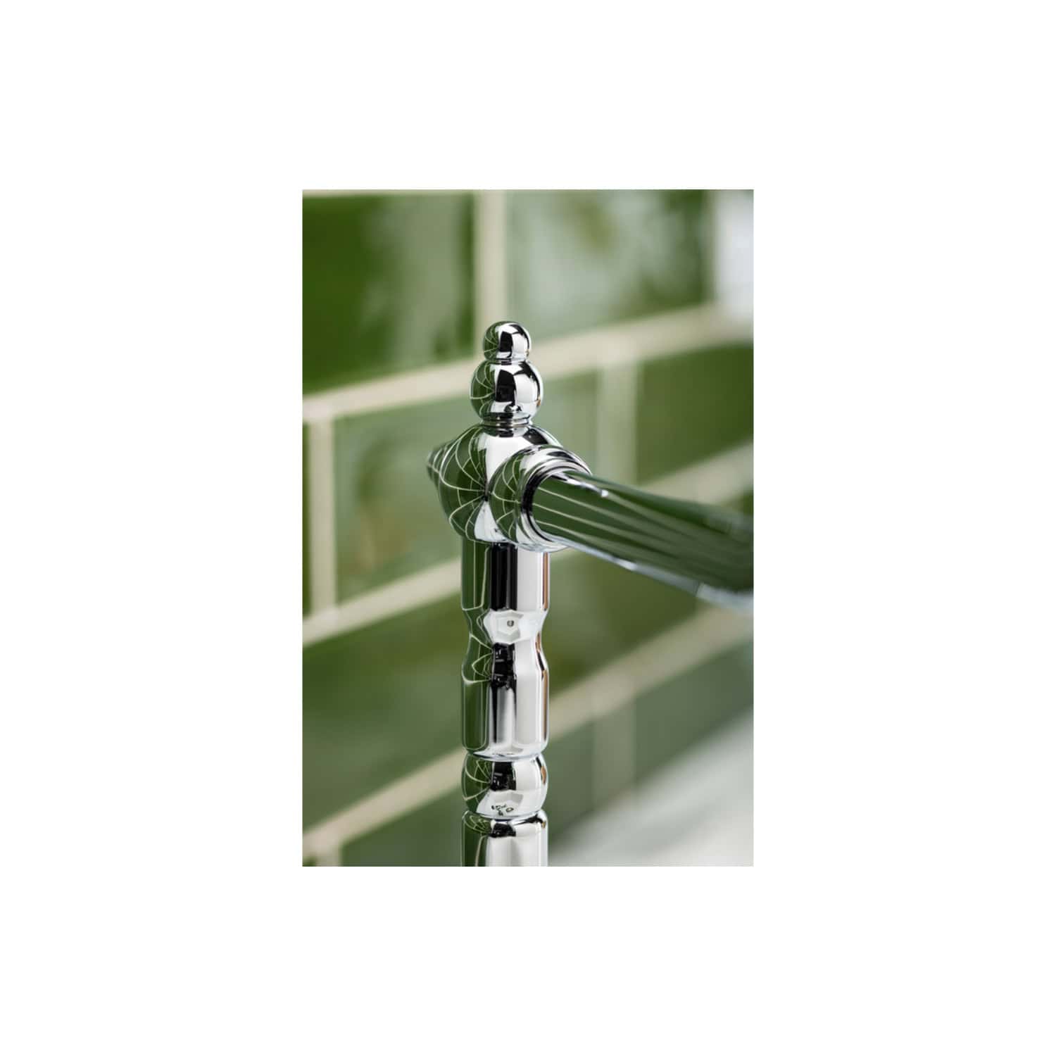 Shiny chrome bathroom tap with green tiled wall background, modern fixtures, close-up, high-quality plumbing hardware, luxurious bathroom design, Bubly Bathrooms.