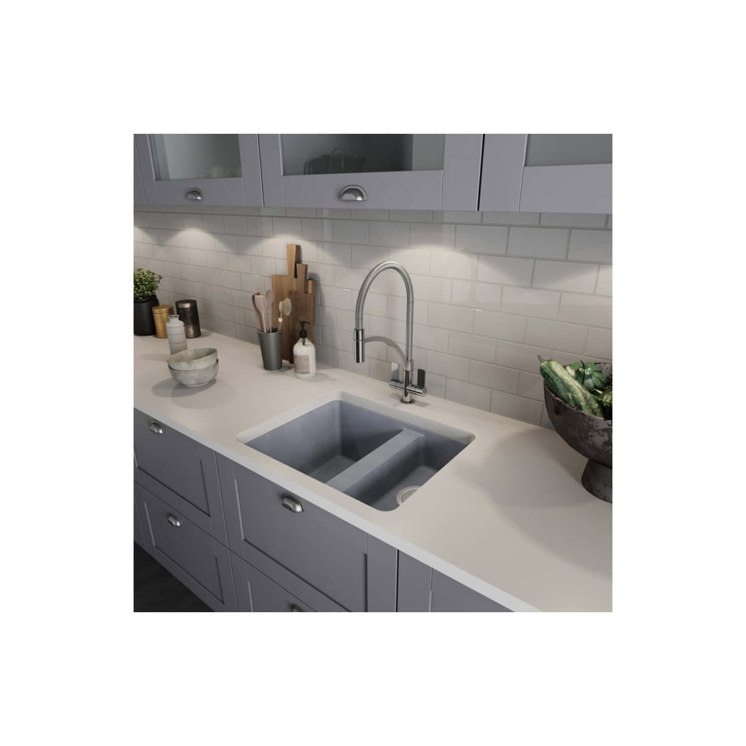 Shaker style grey kitchen cabinets with a white quartz countertop and stainless steel undermount sink. Modern kitchen design featuring under-cabinet lighting and a minimalist decor style.