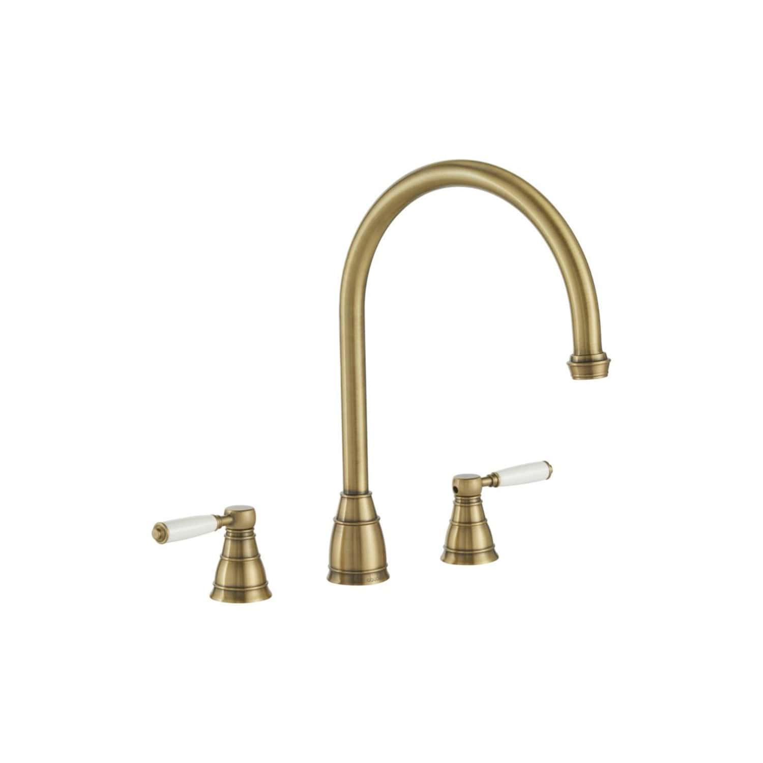 Polished brass kitchen tap with white ceramic levers, traditional design, ideal for bathroom or kitchen upgrade. Durable finish and classic style enhance any space.