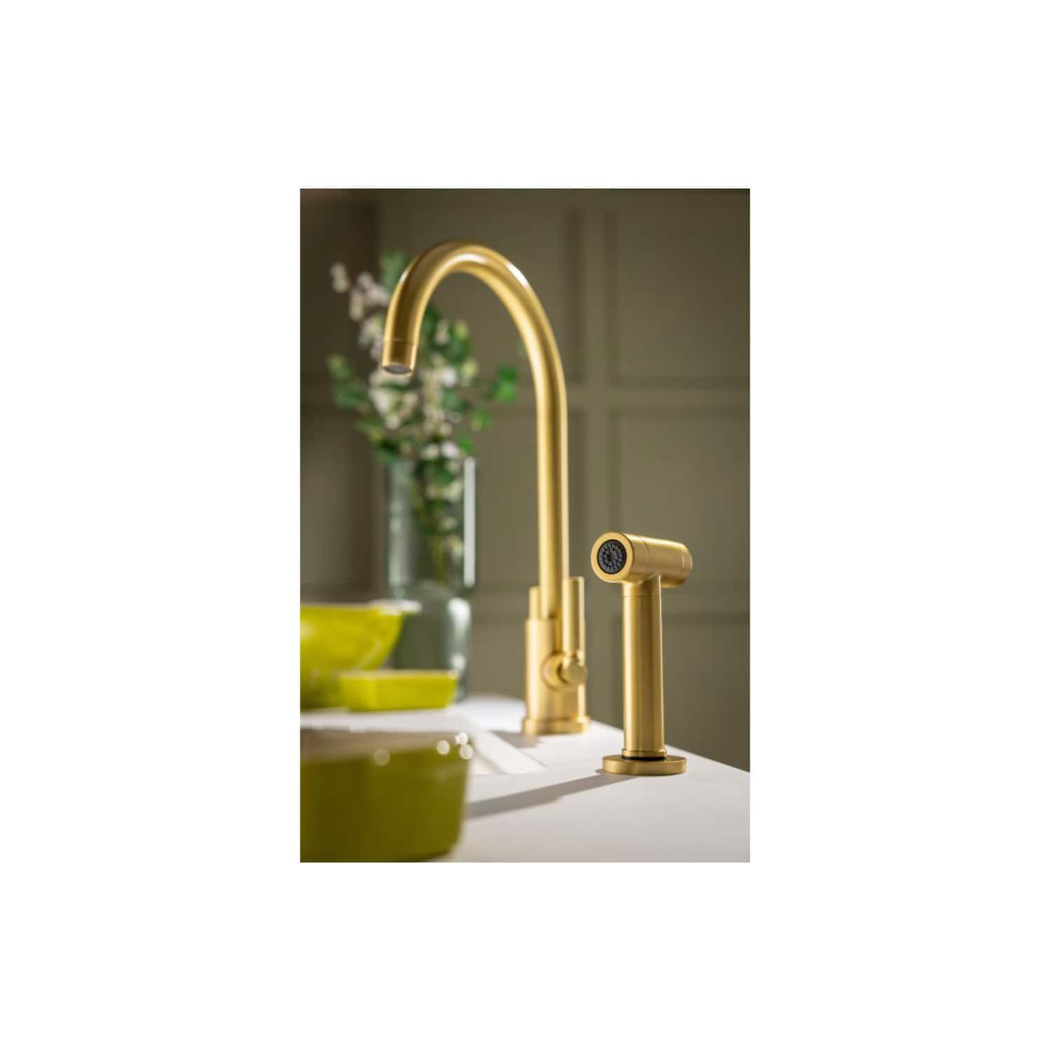 Golden kitchen mixer tap with modern design at Bubly Bathrooms UK. Elegant brass fittings perfect for contemporary bathroom renovations and luxury kitchen upgrades.