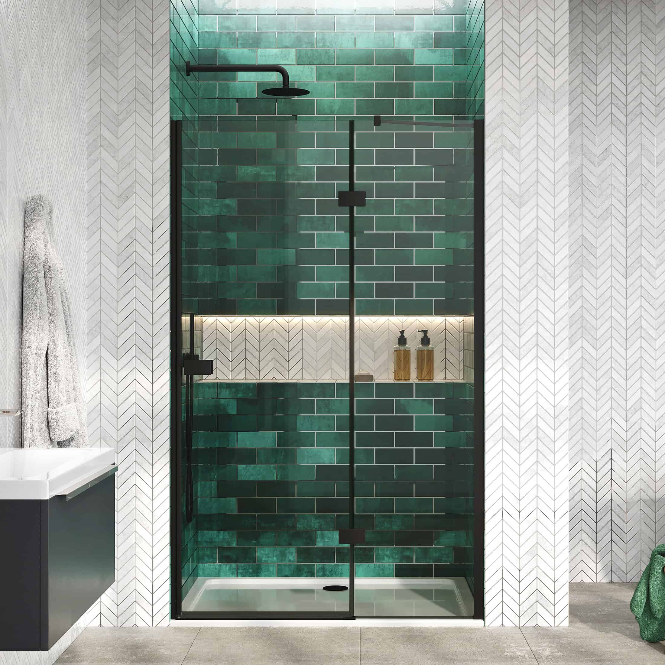 Sleek walk-in shower with dark green subway tiles, black fixtures, and contemporary design elements in a modern bathroom.