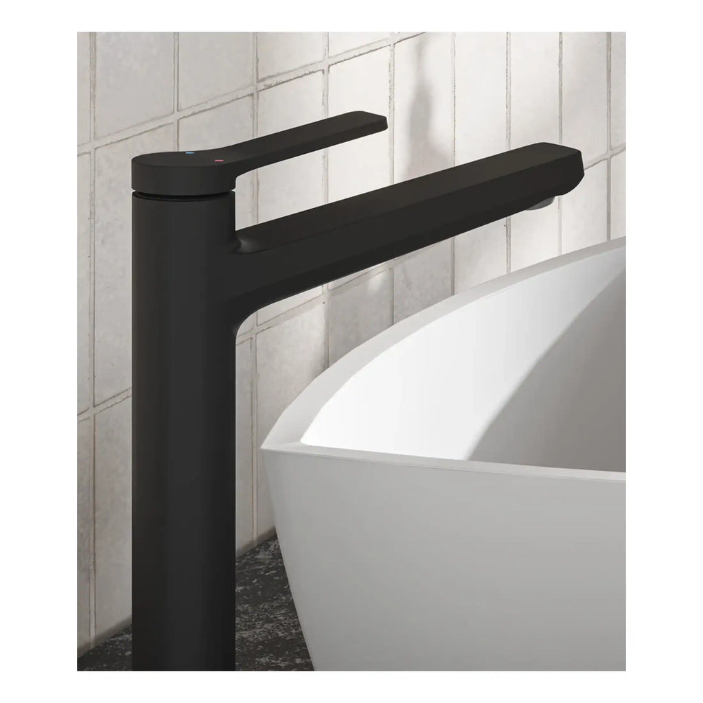 Sleek black bathroom mixer tap next to a modern white bathtub in a contemporary bathroom setting. Perfect for stylish bathroom renovations and high-end fixtures.