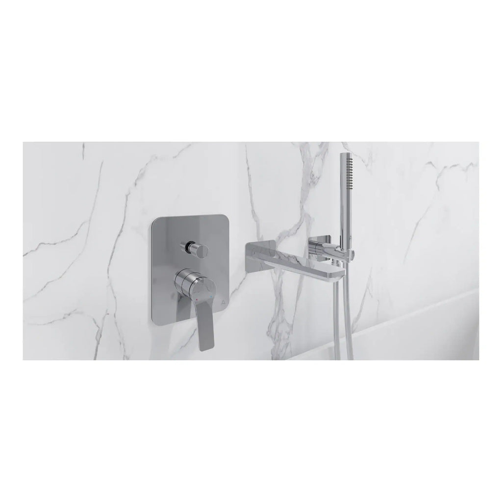 Sleek modern chrome bathroom tap and handheld shower fixture with minimalist design mounted on white marble wall. Perfect for contemporary bathroom renovations and stylish wet room installations.