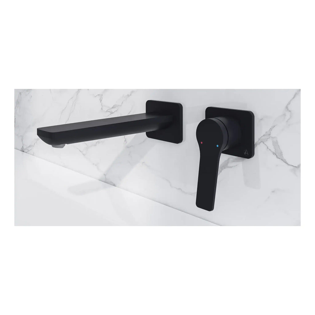 Sleek black modern bathroom mixer tap with a minimalist design, mounted on a white marble wall, ideal for contemporary bathroom renovations.