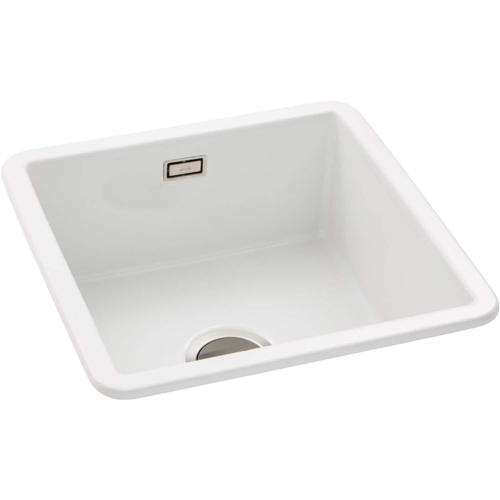 Sleek white kitchen sink with built-in drain and modern design, ideal for contemporary bathroom or kitchen renovation projects. Perfect for scratch-resistant and easy-to-clean surfaces.