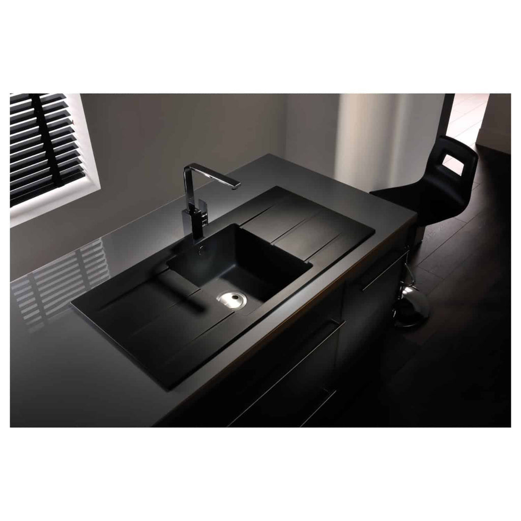 Luxury black kitchen sink with modern chrome faucet, integrated draining areas, sleek dark cabinetry, and natural light from window with blinds – perfect for contemporary kitchen design.