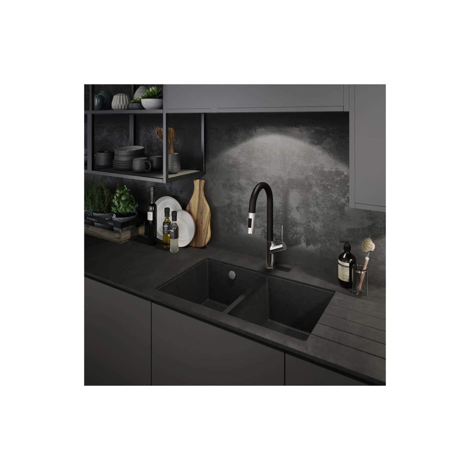 Modern black kitchen sink with double basins and sleek matte black faucet, surrounded by stylish kitchen accessories, cutting boards, and cabinetry in a contemporary kitchen design.