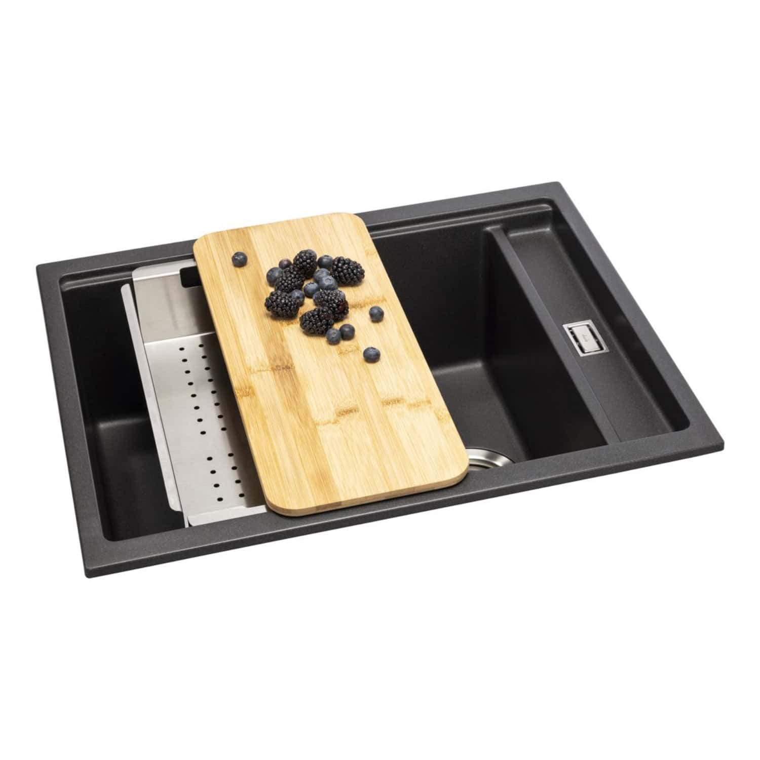 Sleek black kitchen sink with a built-in USB port and a bamboo chopping board with fresh berries, ideal for modern kitchen upgrades and stylish food preparation.