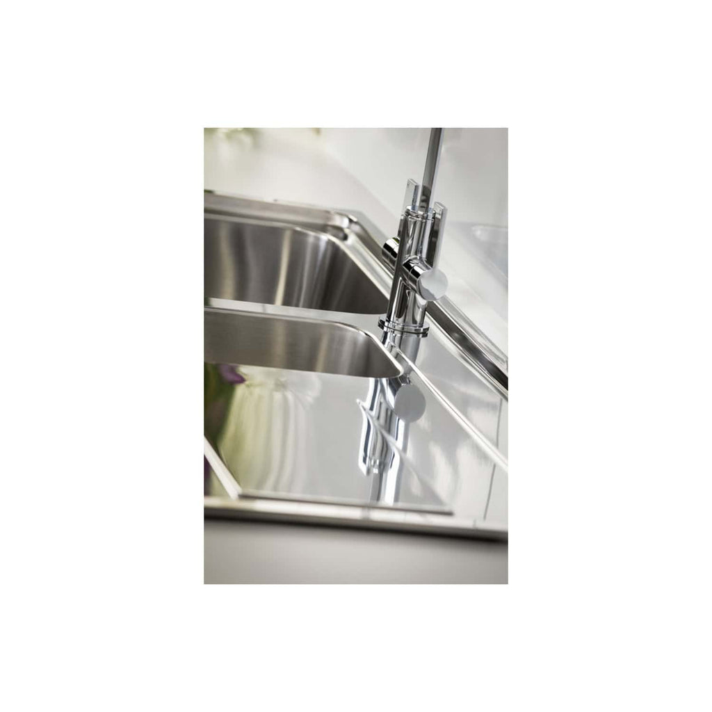Stainless steel kitchen sink with modern chrome mixer tap, sleek design, and reflective surface, perfect for contemporary bathrooms or kitchens. High-quality materials enhance durability and style.