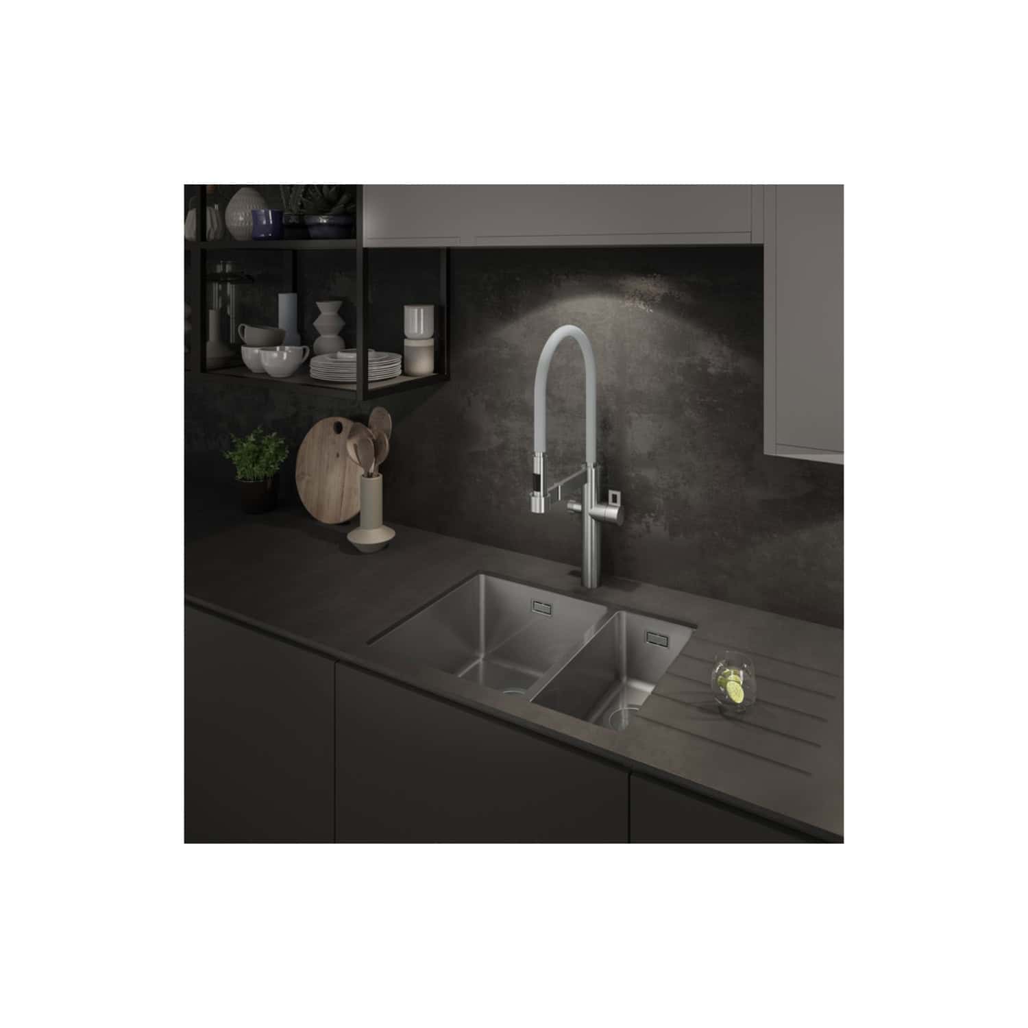 Sleek modern kitchen sink with high-arc mixer tap in a contemporary kitchen setting, featuring minimalist design and dark grey cabinetry for a stylish, functional space.