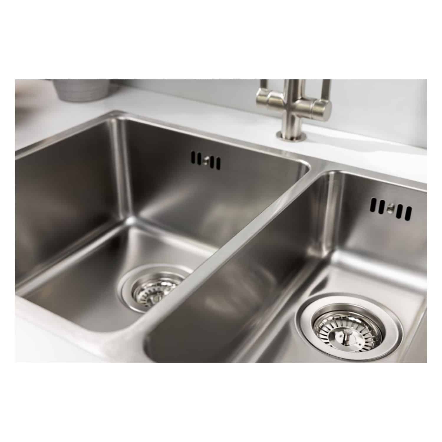 Stainless steel double kitchen sink with modern faucet, perfect for contemporary bathroom or kitchen renovation, showcasing high-quality durable fixtures and sleek design.