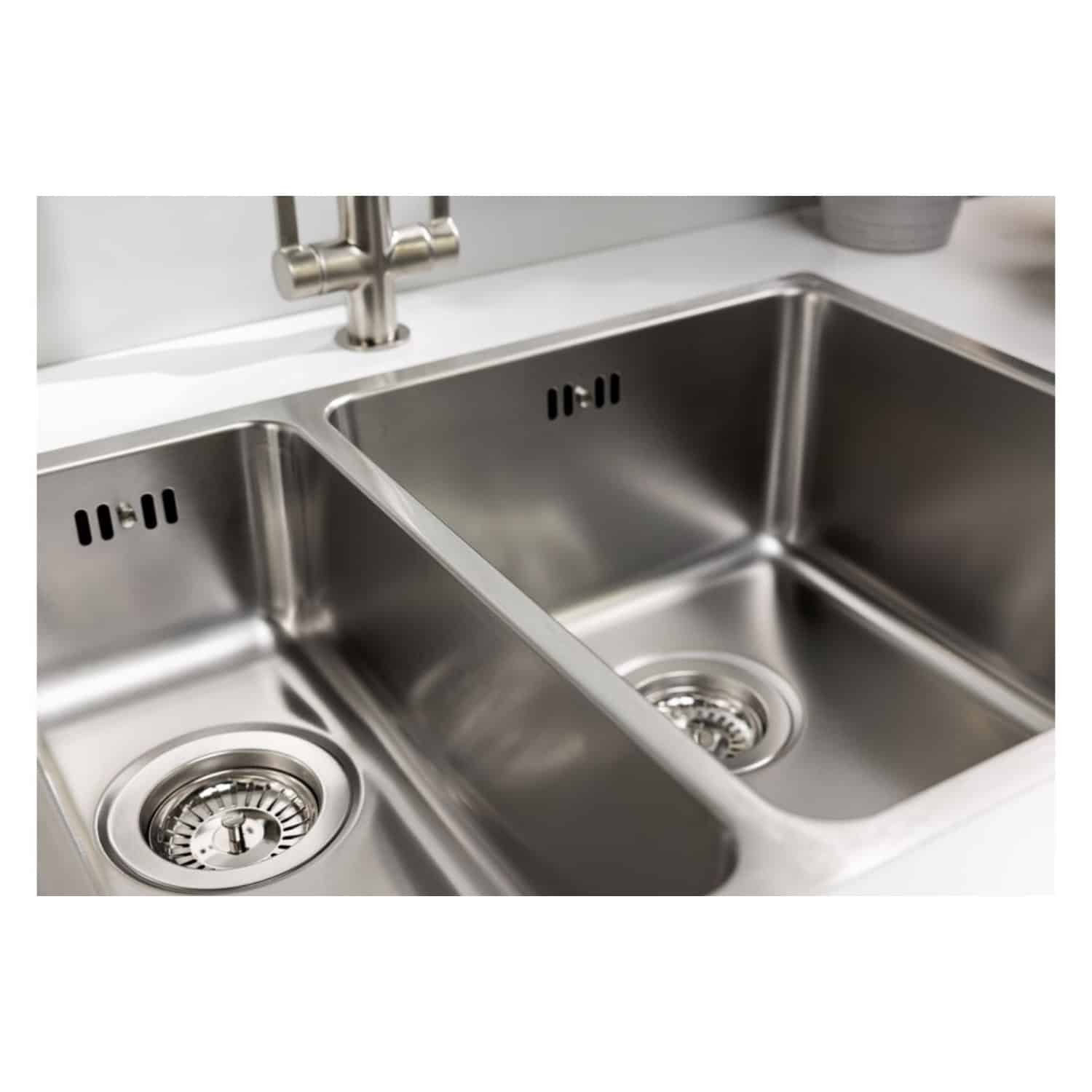 Stainless steel double kitchen sink with modern design, durable material, and efficient drainage system, ideal for contemporary kitchens. Perfect for cooking and cleaning tasks.