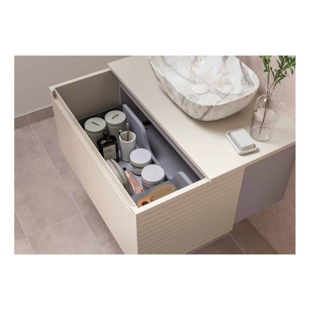 Organised bathroom storage drawer with skincare products, toiletries, and personal care essentials, showcasing modern bathroom design and efficient storage solutions for a stylish bathroom.