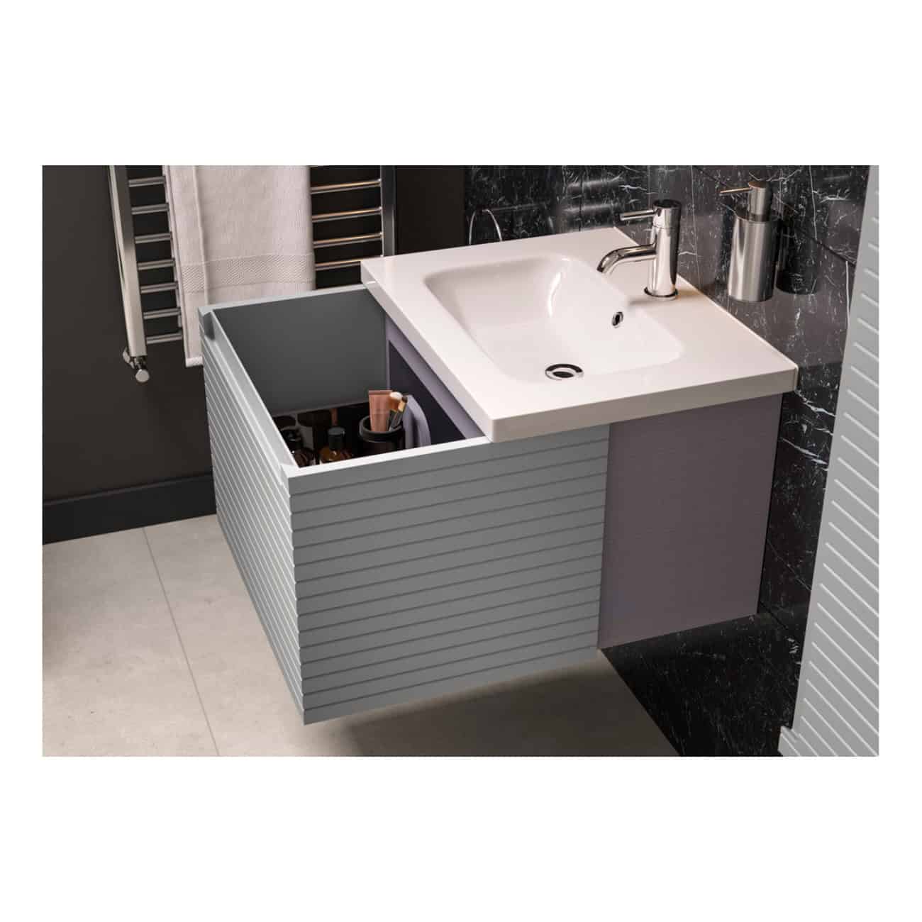 Sleek modern bathroom vanity with a white ceramic sink, grey wooden cabinet with slatted design, and built-in storage for toiletries, featuring chrome fixtures and a black marble backsplash for contemporary style.