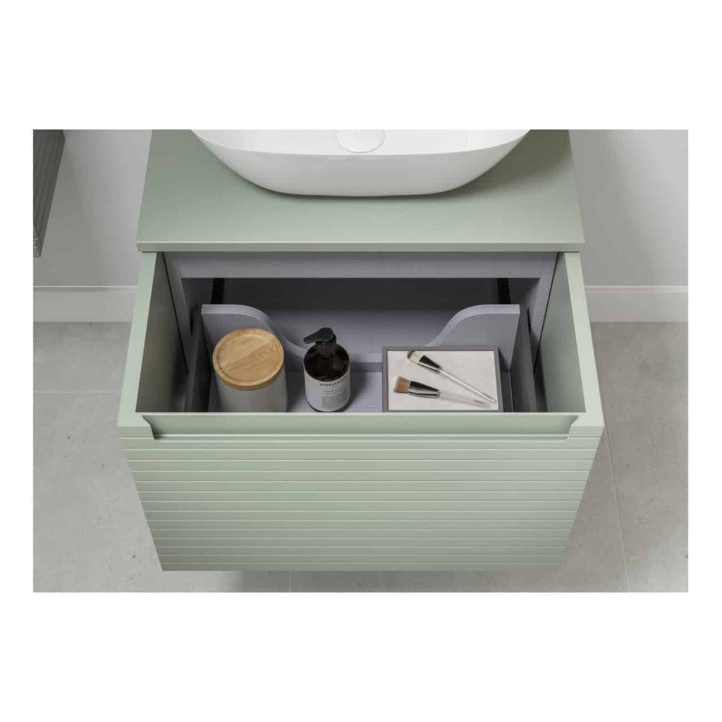 Stylish bathroom vanity with open storage drawer containing soap dispenser, brush, and skincare products, designed for modern bathroom organisation and decor.