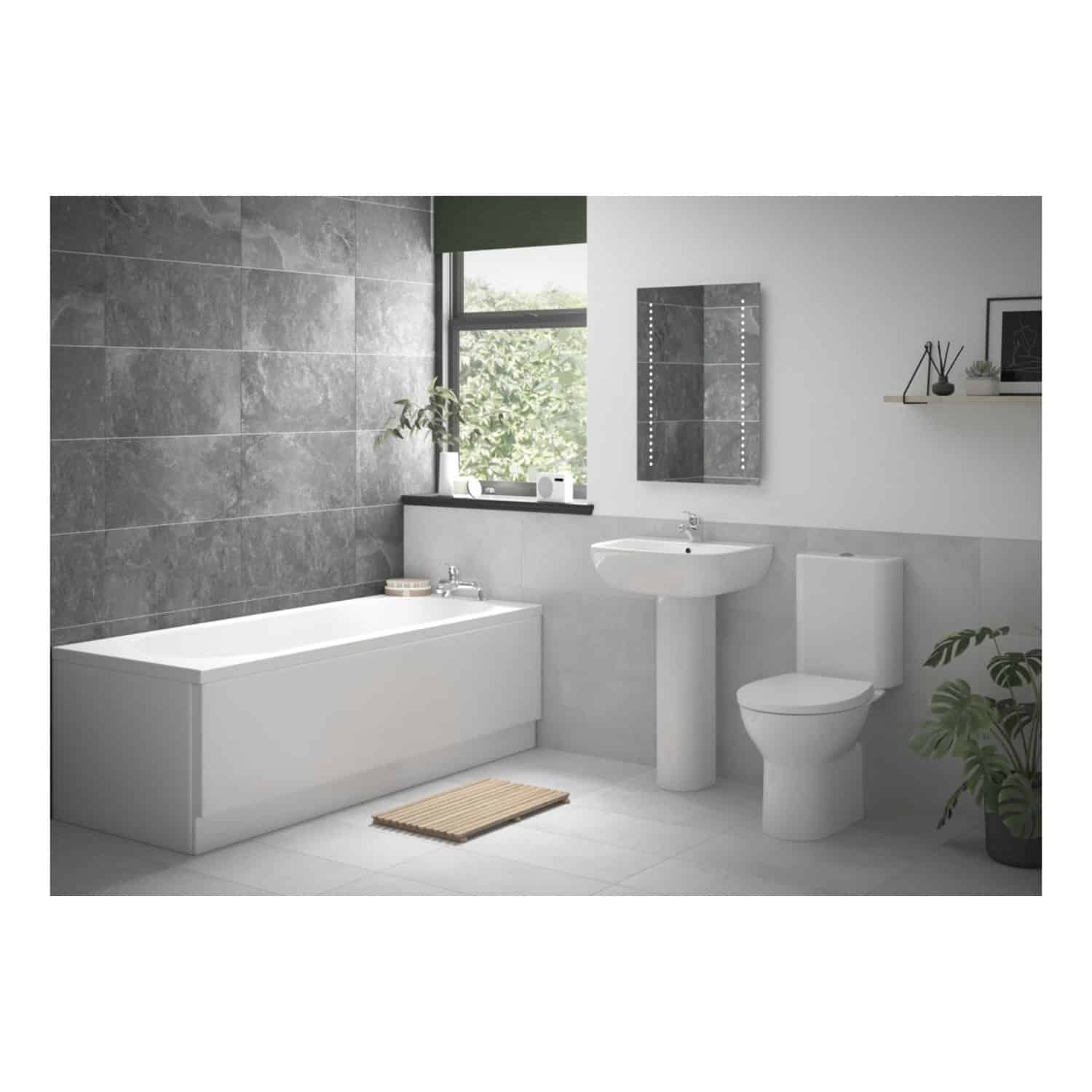 Minimalist modern bathroom with grey textured accent wall, white bathtub, pedestal sink, and toilet, complemented by sleek mirror, wooden shelf, and houseplants, creating a clean and contemporary bathroom design.