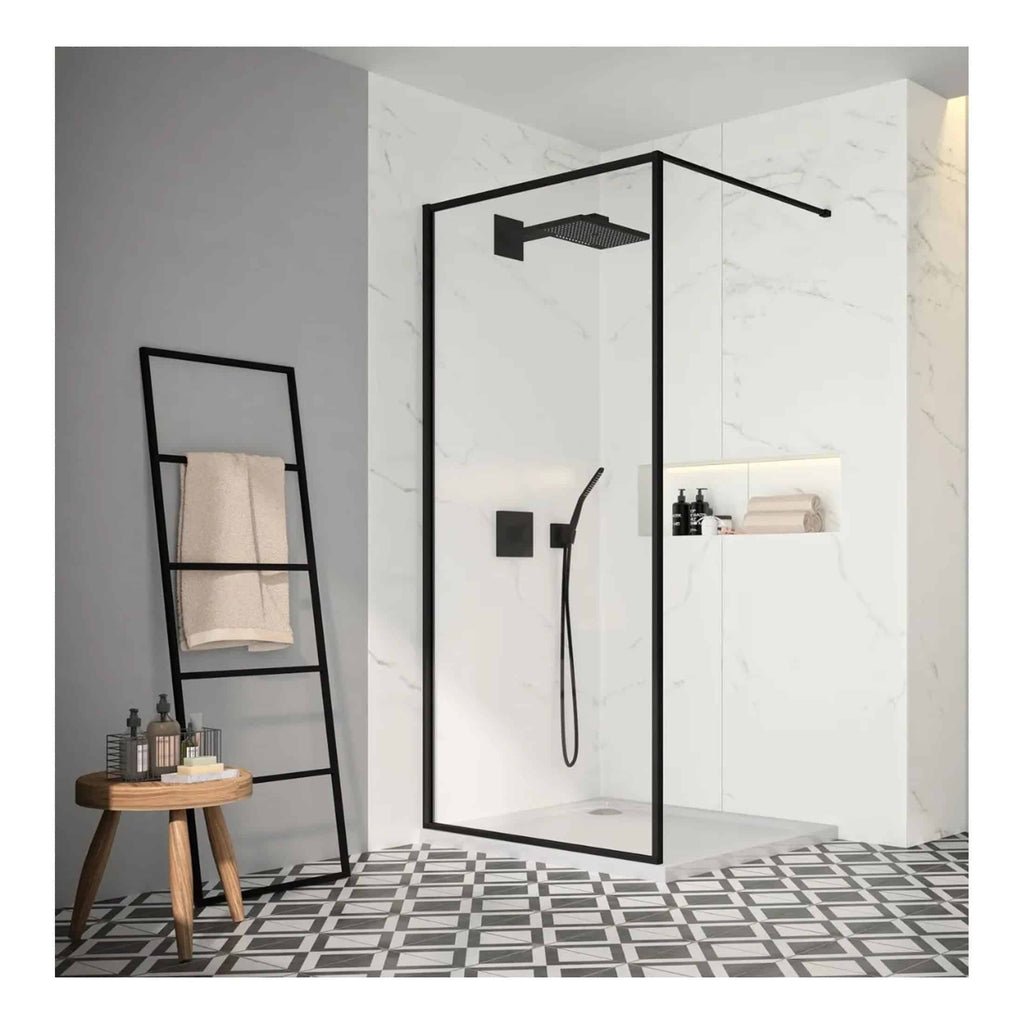 Modern black-framed walk-in shower with black fixtures in a sleek contemporary bathroom setting.