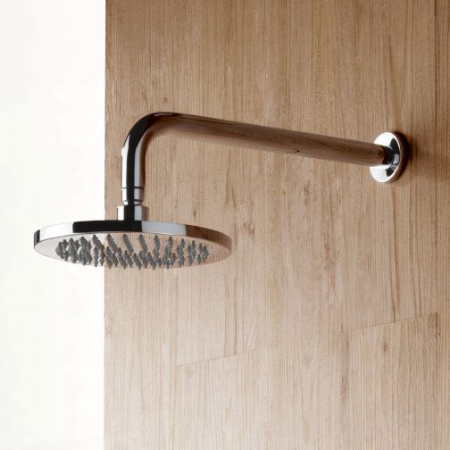 Showerhead with chrome finish mounted on a wooden wall, modern bathroom fixture, high-quality rainfall shower head, bathroom renovation, Bubly Bathrooms.