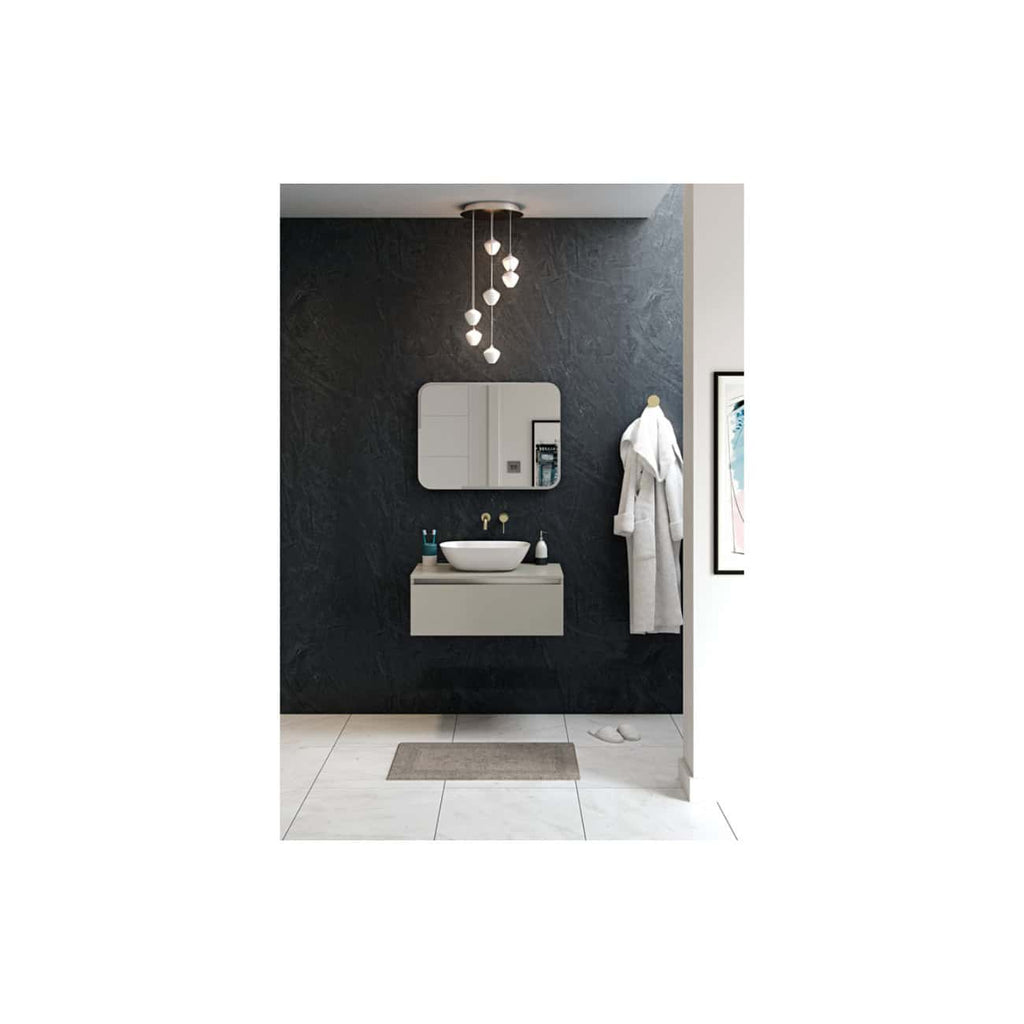 Sleek modern bathroom with floating grey vanity, vessel sink, stylish mirror, contemporary lighting, and a plush bathrobe for a luxurious bathroom design.