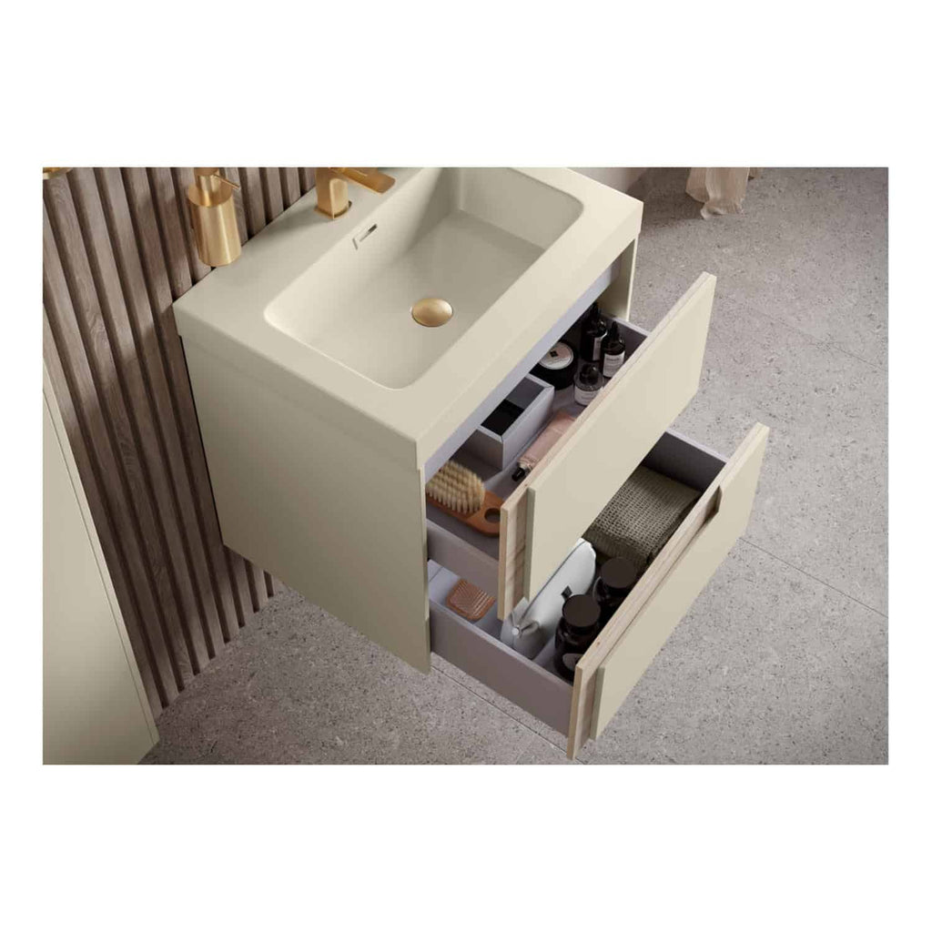 Polished beige bathroom vanity with integrated sink and gold fixtures, featuring open drawers with storage for toiletries and grooming items, set against textured wall and floor.