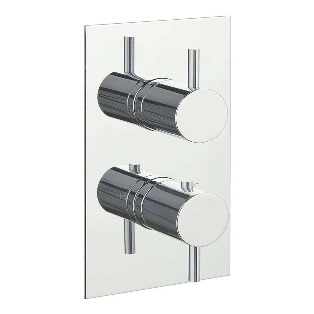 Brass shower valve with chrome finish on white wall mount, modern bathroom fixture for precise water control. Ideal for contemporary showers, designed for durability and style.
