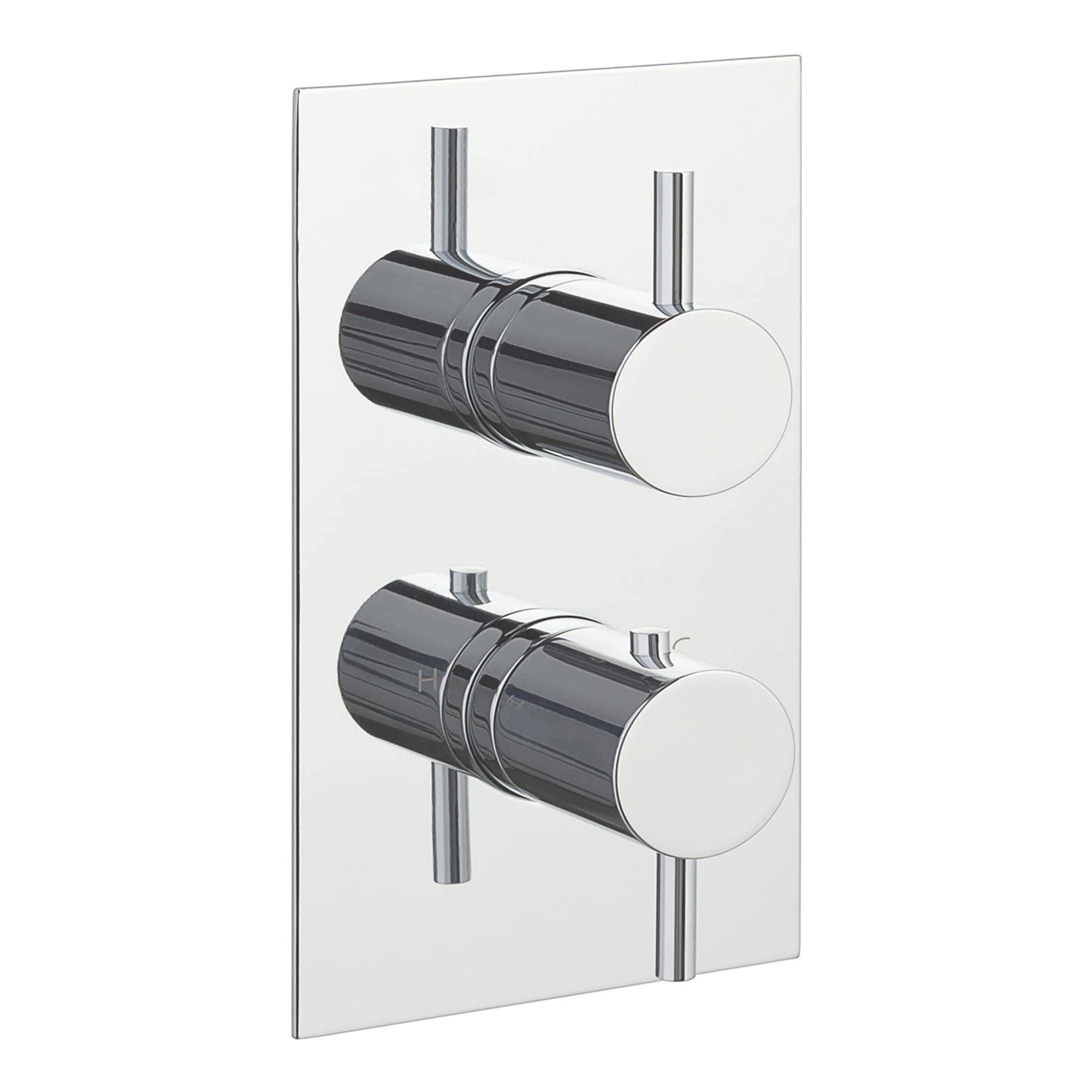 Brass shower valve with chrome finish on white wall mount, modern bathroom fixture for precise water control. Ideal for contemporary showers, designed for durability and style.