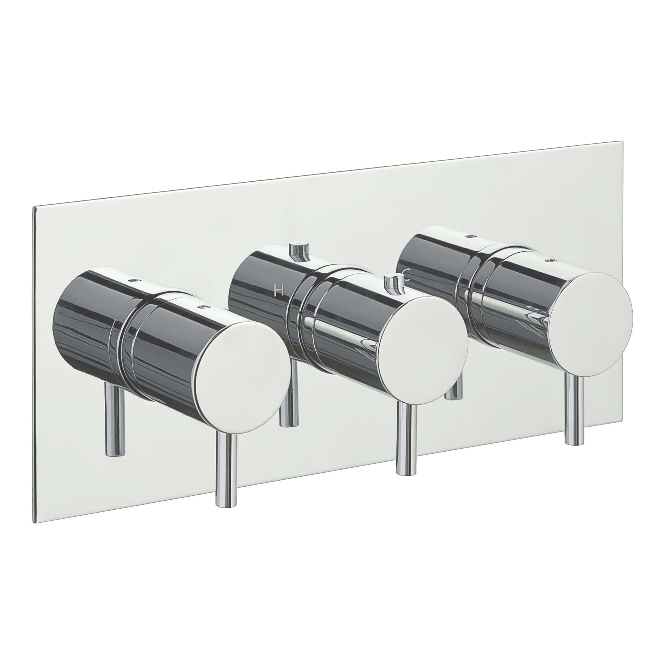Sleek chrome bathroom thermostat with dual control knobs mounted on a reflective white wall panel for modern bathroom design.