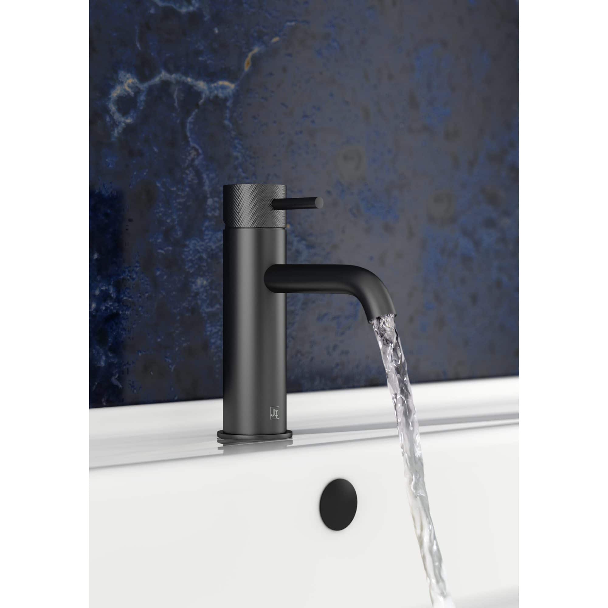 Sleek black bathroom tap with flowing water, modern design by Bubly Bathrooms in the UK. Perfect for contemporary bathroom renovations and stylish fixtures.