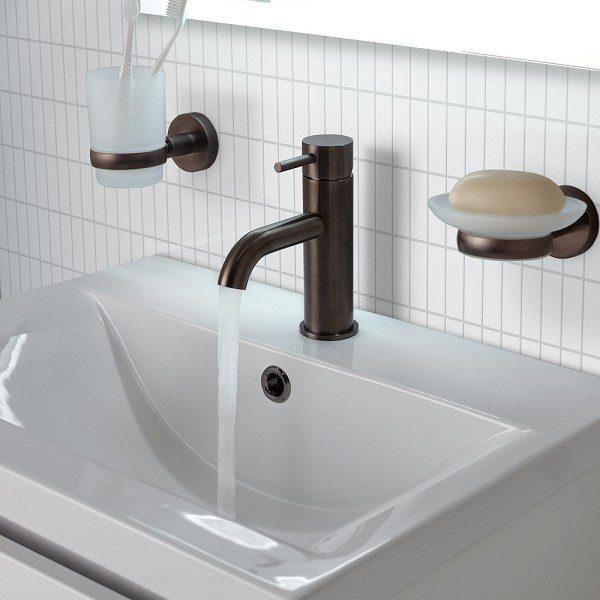 Enhanced bathroom sink with modern black tap, soap dish, and toothbrush holder, designed for stylish and functional Bubly Bathrooms. Perfect for contemporary bathroom updates.