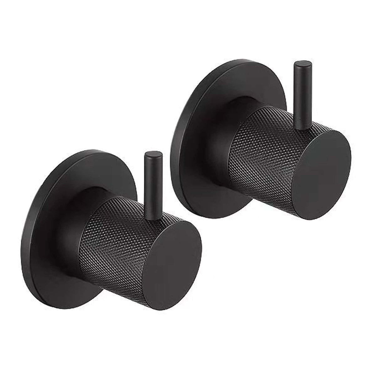 Black minimalist bathroom wall hooks for modern interiors, featuring textured cylindrical design with loop handles, ideal for hanging towels, robes, or accessories in contemporary bathroom spaces.