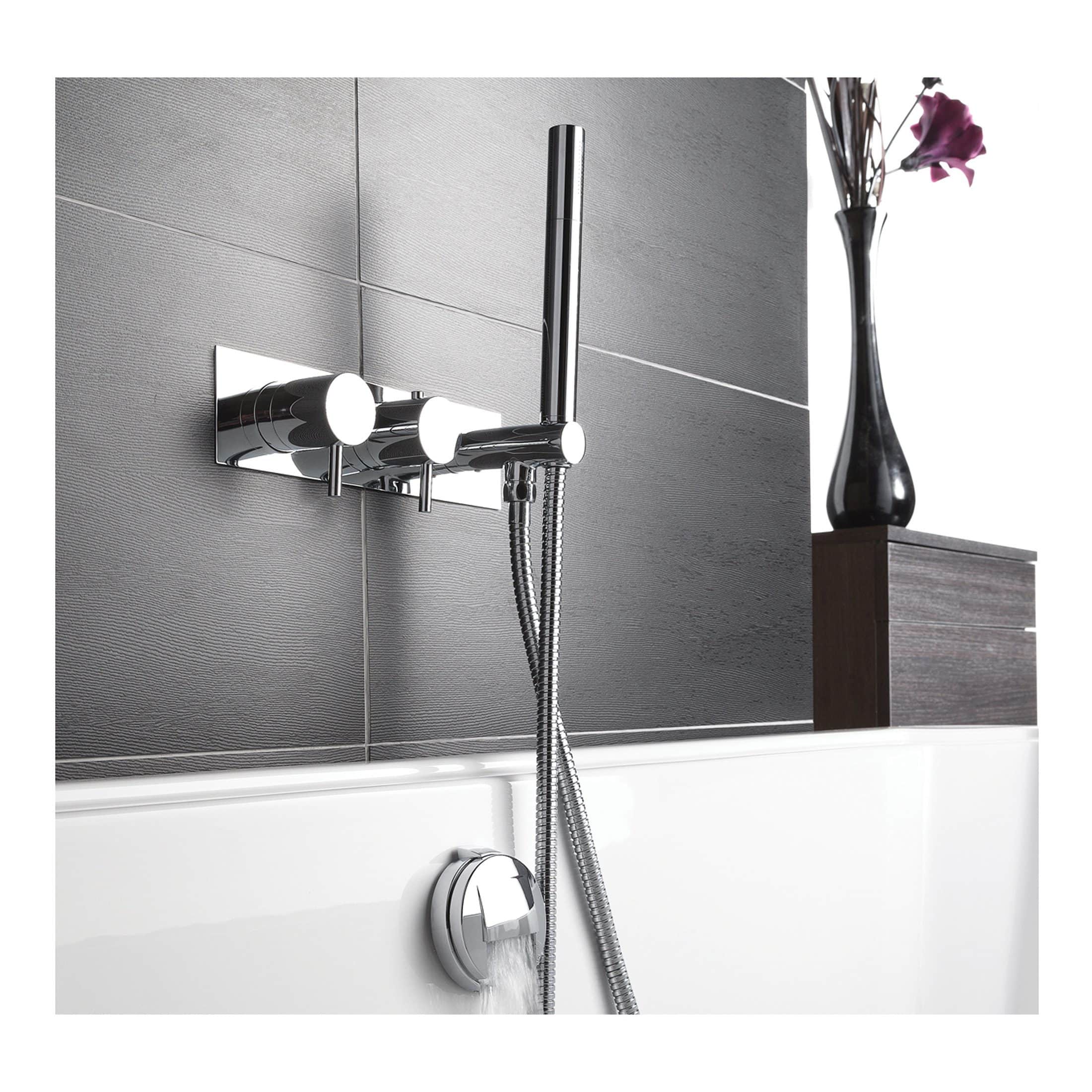 Sleek modern chrome bathroom shower faucet with handheld shower head and wall mount, perfect for contemporary bathrooms.