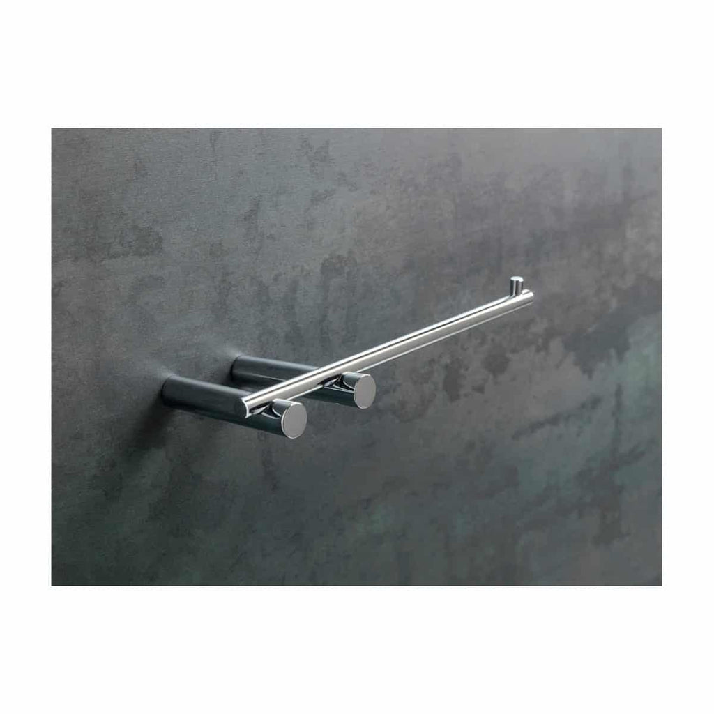 Polished chrome grab bar mounted on a modern grey bathroom wall for safety and support in contemporary bathroom design.