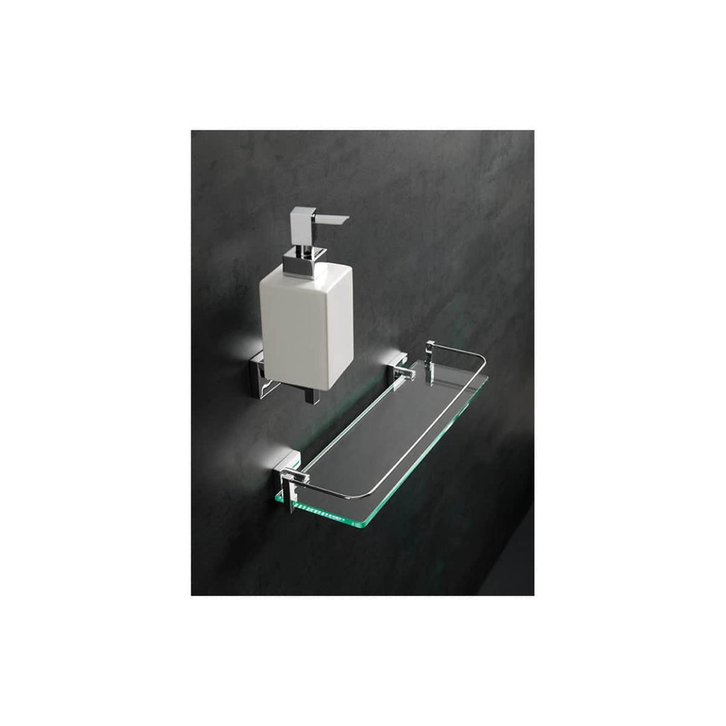 Sleek modern bathroom soap dispenser and glass shelf with chrome finish against dark wall, showcasing luxury bathroom accessories from Bubly Bathrooms.